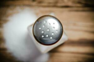 Salt background . On wooden table. photo