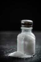 Salt background . On black table. photo