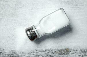 Salt background . On white table. photo