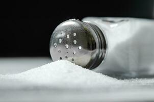 Salt background . On white table. photo