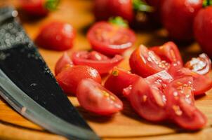 Fresh chopped tomatoes. On cutting board. photo