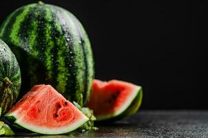 Fresh watermelons on table . photo