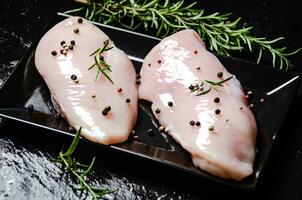 Fresh chicken fillet with spices. photo