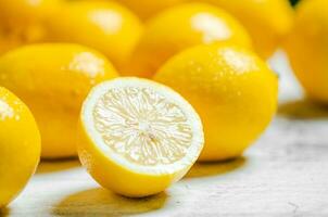 Fresh lemons. On light table. photo