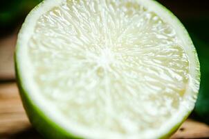 Fresh limes. On wooden table. photo