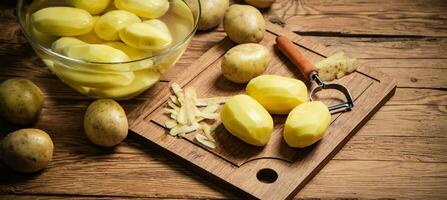 Fresh peeled potatoes. photo