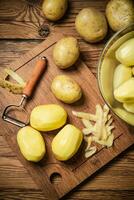 Fresh peeled potatoes. photo