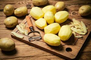 Fresh peeled potatoes. photo