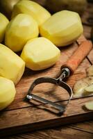 Fresh peeled potatoes. photo