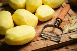 Fresh peeled potatoes. photo