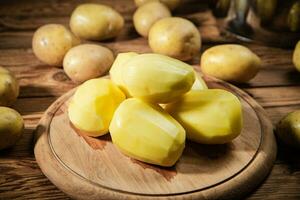 Fresh peeled potatoes. photo