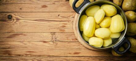 Fresh peeled potatoes. photo