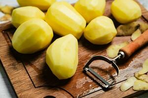 Fresh peeled potatoes. photo