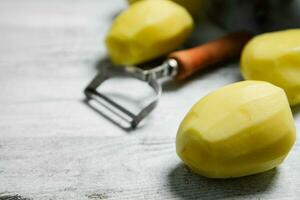 Fresh peeled potatoes. photo