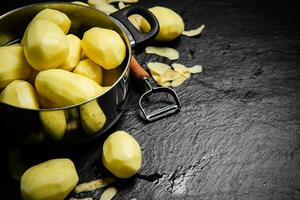 Fresh peeled potatoes. photo