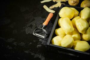 Fresh peeled potatoes. photo