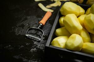 Fresh peeled potatoes. photo