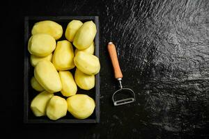 Fresh peeled potatoes. photo