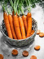 Fresh carrots in basket. photo