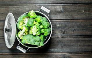 Broccoli in pot . photo