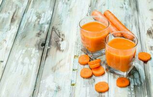 Carrot juice in a glass Cup. photo