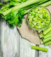 Pieces of celery in a bowl. photo