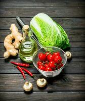 Organic food. Ripe tomatoes with green vegetables. photo