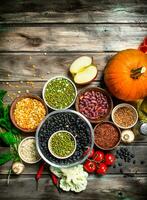 Healthy food. Healthy assortment of vegetables and fruits with legumes. photo