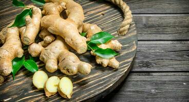 Fresh ginger on a tray. photo