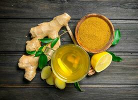 Ginger tea and ground ginger. photo