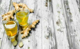 Ginger tea and fresh ginger. photo