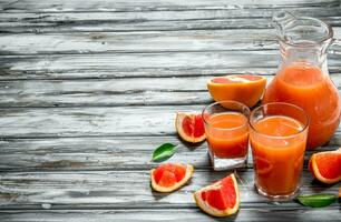 Grapefruit juice in a glass. photo