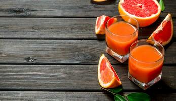 Grapefruit juice in a glass. photo