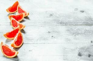 Pieces of ripe grapefruit. photo