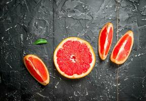 Pieces of ripe grapefruit. photo