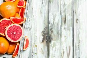 Ripe grapefruit in the box. photo