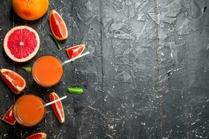 Grapefruit juice in a glass. photo