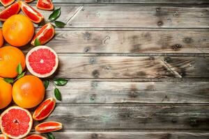 Fresh juicy grapefruit with leaves. photo