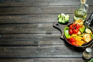 A variety of grilled vegetables with a frying pan. photo