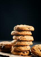 A pile of milk chocolate cookies. photo