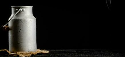 A can of milk on a napkin. photo