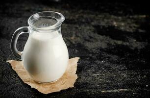 A full jug of fresh milk. photo