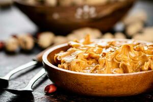 A plate of peanut butter on the table. photo