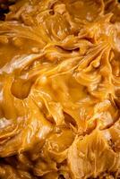 Fresh peanut butter. Macro background. photo