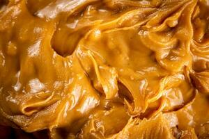 Fresh peanut butter. Macro background. photo