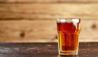 Freshly squeezed apple juice in a glass. photo