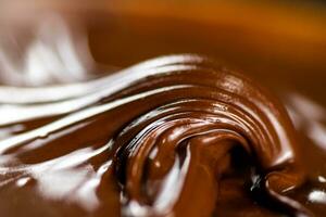 Hazelnut butter curl. Macro background. photo