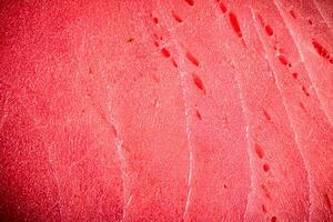 Raw tuna steak. Macro background. photo