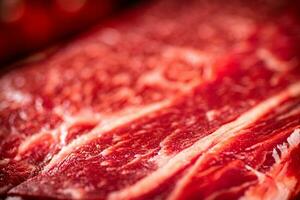 Raw beef pulp. Macro background. Beef texture. photo