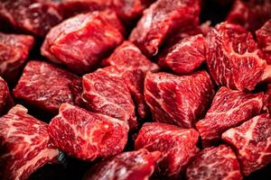 Pieces of raw beef. Macro background. photo